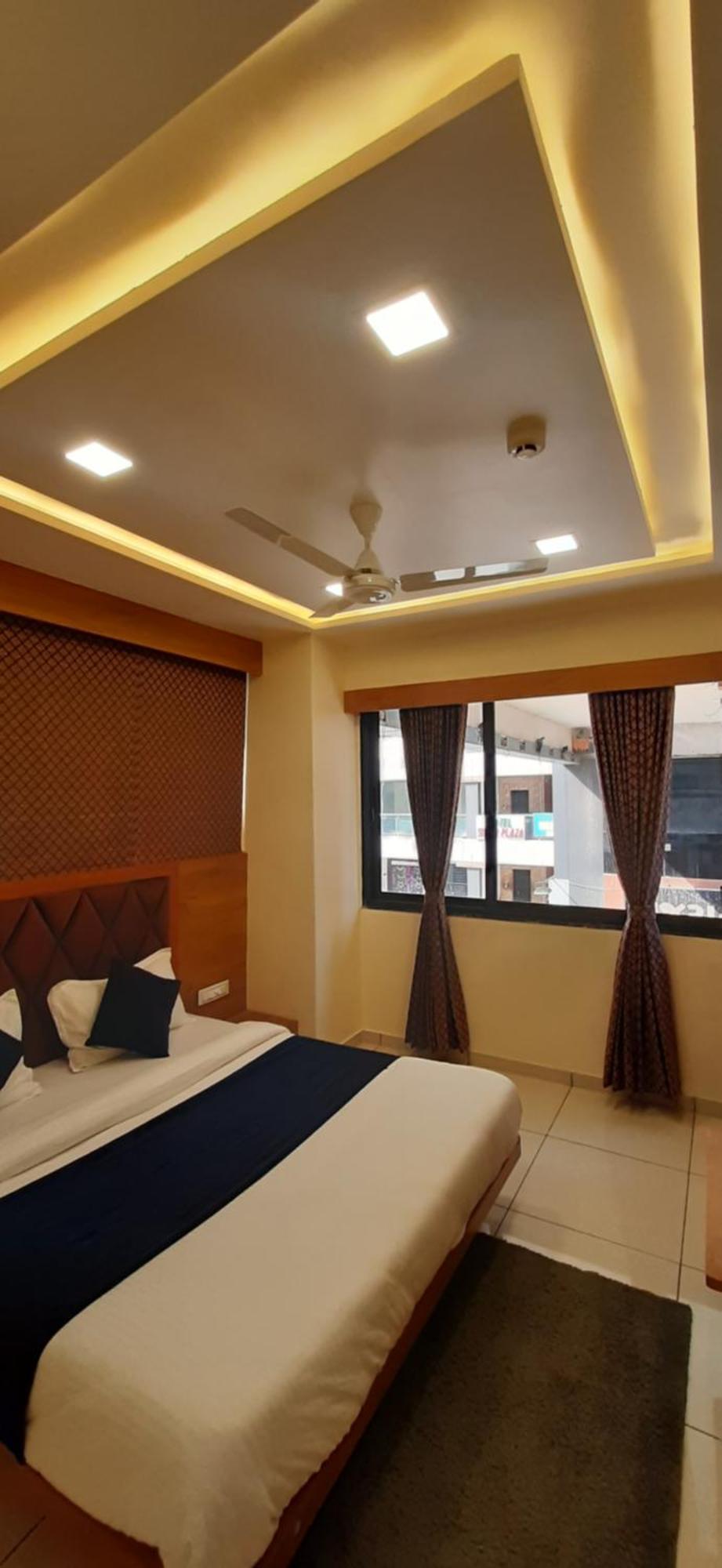 אחמדאבאד Hotel Suncity חדר תמונה