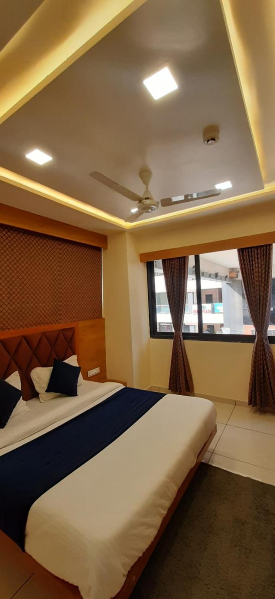 אחמדאבאד Hotel Suncity חדר תמונה