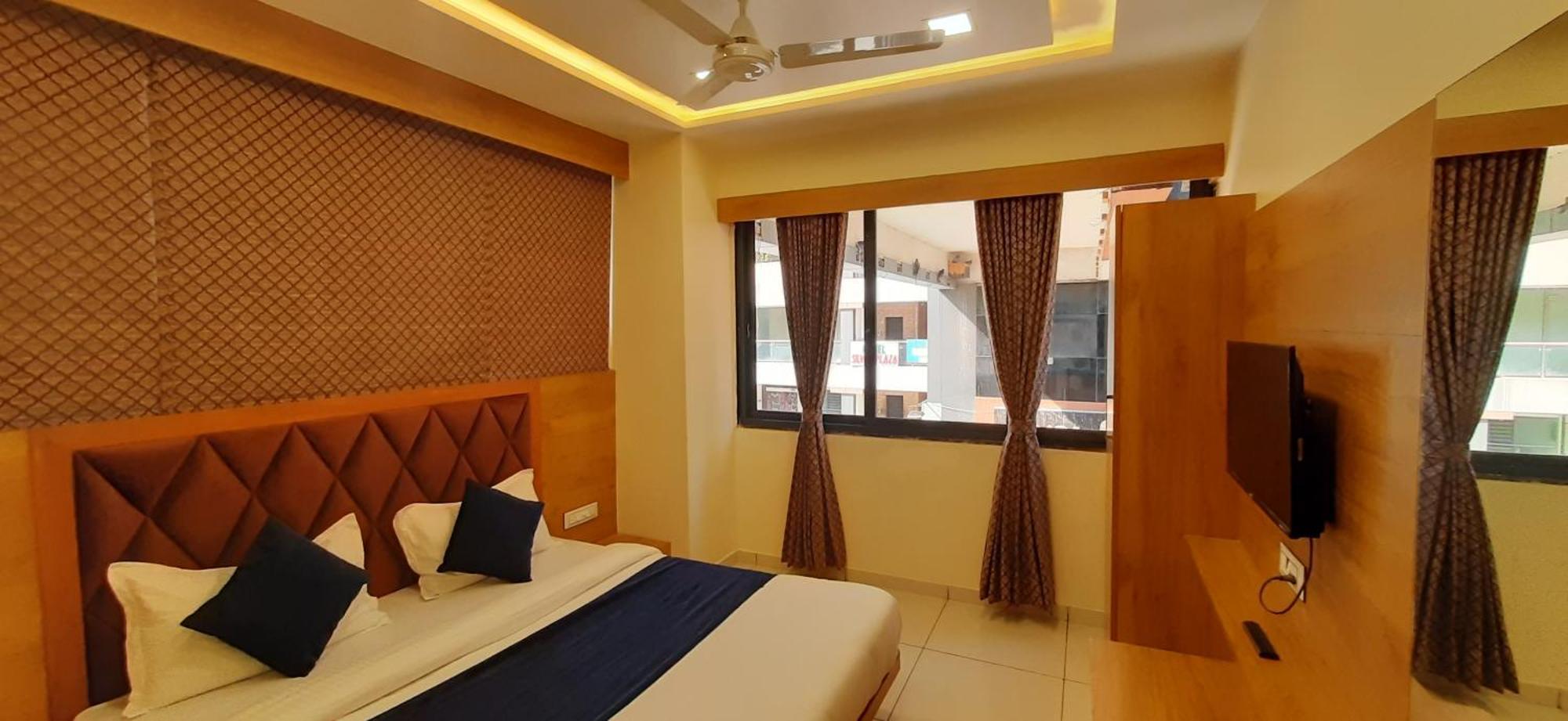 אחמדאבאד Hotel Suncity חדר תמונה
